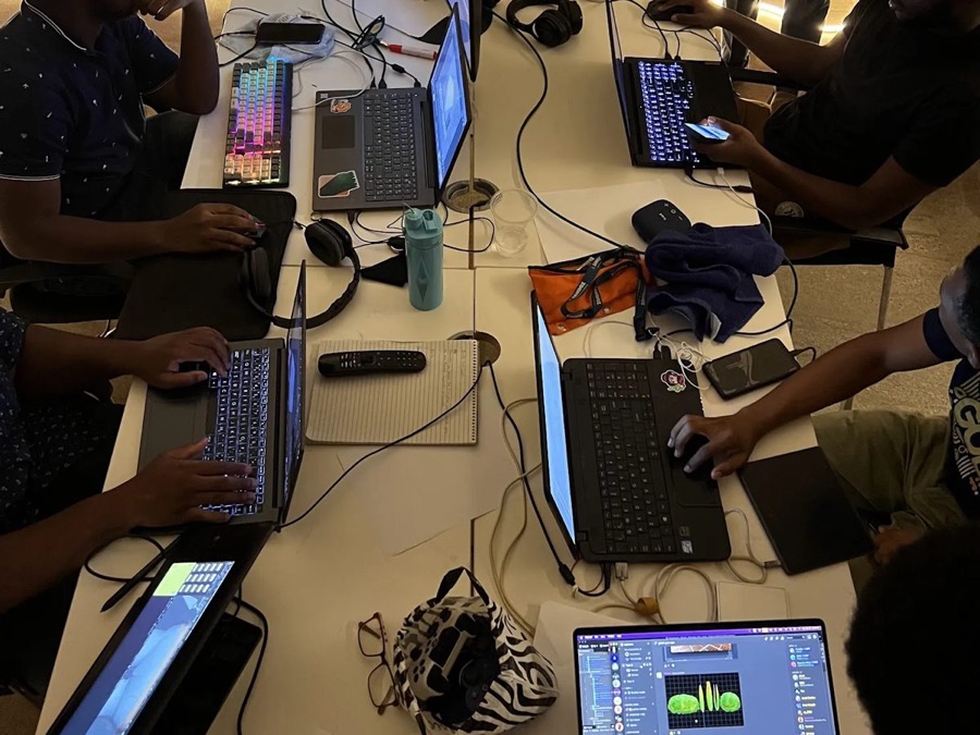 The Creative Leaf crew around one table with their laptops